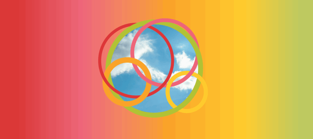 Colorful interlocking circles with a cloudy sky center on a gradient background from red to green.
