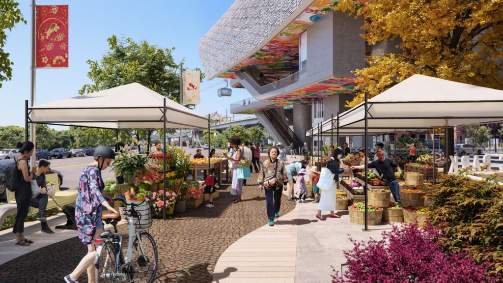 A vibrant outdoor market features people shopping for produce under tents, with colorful urban architecture in the background.